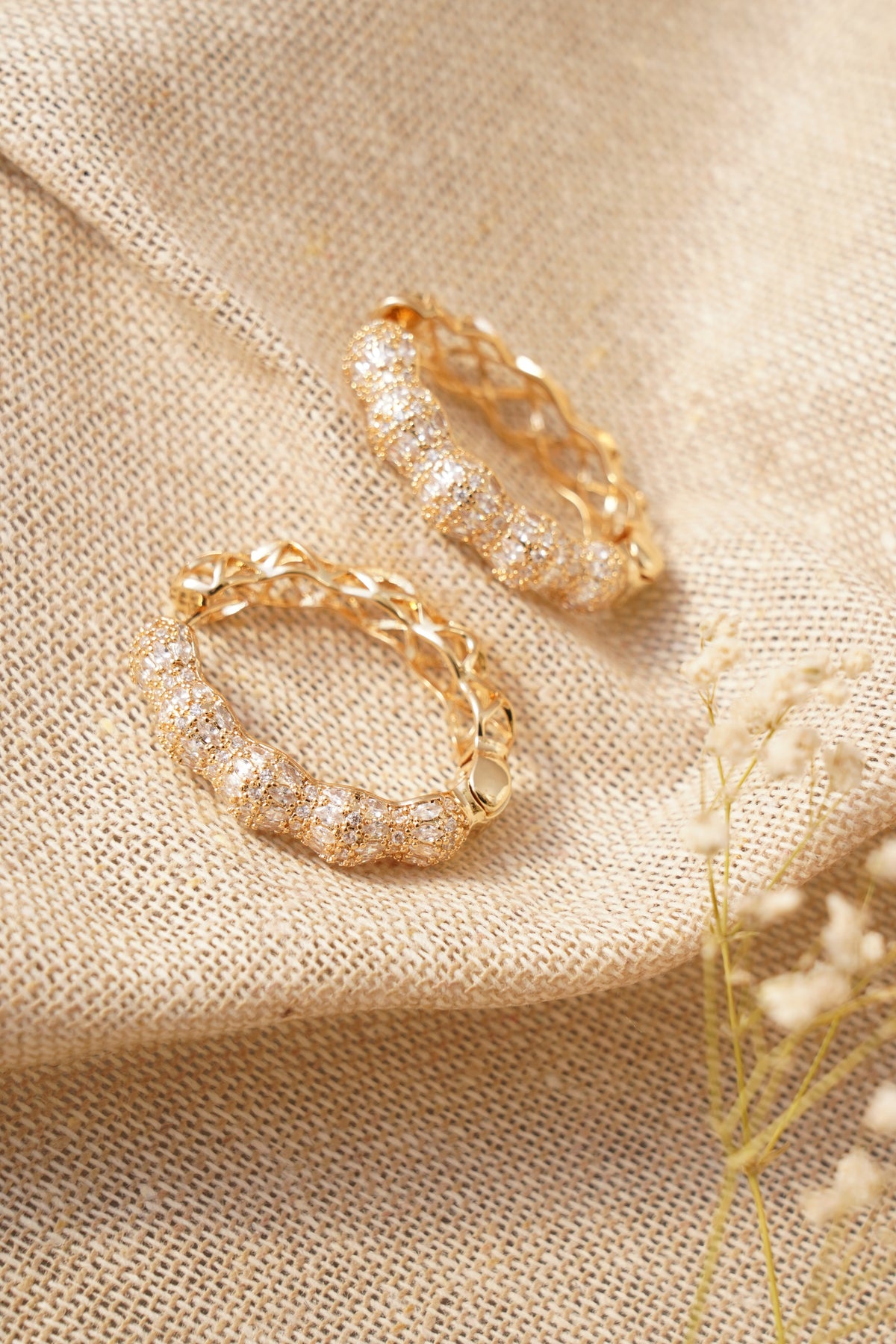 Diamond-Encrusted Sculptural Hoops - image 3